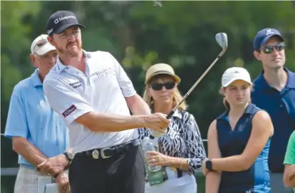  ??  ?? Jimmy Walker matched his career-low round in a major with a 65 to grab the first-round lead at the PGA Championsh­ip.