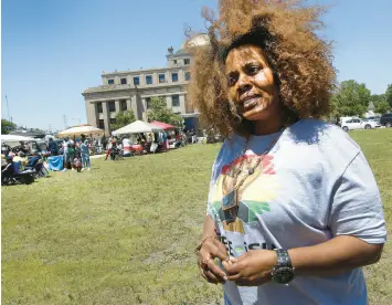  ?? ?? Angela Hargro, a metalsmith, talks about the holiday during the Juneteenth Freedom Festival on Saturday.