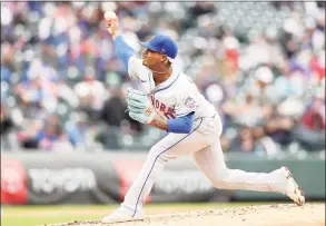  ?? Matthew Stockman / TNS ?? Mets starting pitcher Marcus Stroman throws against the Colorado Rockies during the second inning at Coors Field in Denver on Sunday.