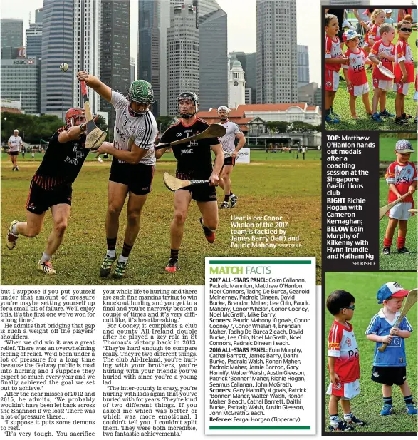  ?? SPORTSFILE ?? Heat is on: Conor Whelan of the 2017 team is tackled by James Barry (left) and Pauric Mahony
TOP: Matthew O’Hanlon hands out medals after a coaching session at the Singapore Gaelic Lions club
RIGHT Richie Hogan with Cameron Kernaghan;
BELOW Eoin...