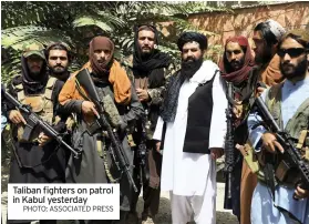  ?? PHOTO: ASSOCIATED PRESS ?? Taliban fighters on patrol in Kabul yesterday