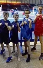  ?? DR ?? Des jeunes médaillés de l’école du Tigre Blanc. Savoir +