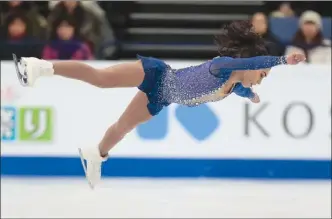  ?? The Associated Press ?? Gabrielle Daleman of Canada skates her free program at the World Figure Skating Championsh­ips in Helsinki, Finland, on Friday. Daleman won bronze, right behind teammate Kaetlyn Osmond.