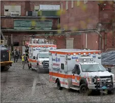  ?? STUART CAHILL PHOTOS / HERALD STAFF FILE ?? ‘WHAT IS HAPPENING HERE?!’ The South Boston Edison plant, above, with a police and fire presence outside on Wednesday following a partial collapse that injured three workers. The collapse is the second life-threatenin­g accident to take place in the last two months across the city.