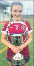  ?? ?? Junior captain Aoife Walsh proudly holding the cup following victory over Tarbert.