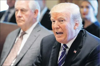  ?? AP PHOTO ?? U. S. Secretary of State Rex Tillerson listens as President Donald Trump announces the United States will designate North Korea a state sponsor of terrorism during a cabinet meeting at the White House Monday.