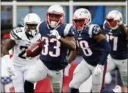  ?? ASSOCIATED PRESS FILE PHOTO ?? FILE- New England Patriots running back Dion Lewis (33) returns the opening kickoff in the second half of a game against the Los Angeles Chargers in Foxborough, Mass.