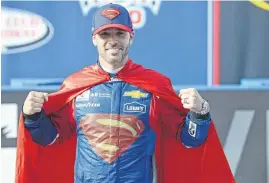  ??  ?? CAN ANYONE BEAT JIMMIE JOHNSON? Driver Jimmie Johnson poses for a photo wearing a superman cape in after winning the Auto Club 400 NASCAR Sprint Cup Series at Auto Club Speedway last month. Johnson is the driver to beat this weekend.
XFINITY RACE?