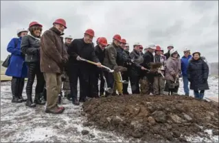  ?? GARY YOKOYAMA, THE HAMILTON SPECTATOR ?? The mayor, councillor­s, city staff and Morelli family members at the Bernie Morelli Recreation Centre site Thursday.