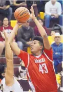  ?? JIM THOMPSON/JOURNAL ?? Bernalillo High senior post Solomon Fragua takes a shot over a Belen defender on Thursday night.