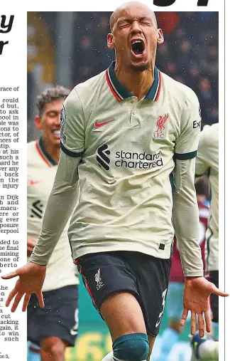  ?? GETTY IMAGES ?? Digging deep: Liverpool’s Fabinho celebrates his goal