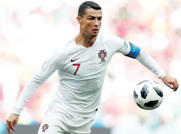  ?? FRANCISCO SECO / THE ASSOCIATED PRESS ?? Portugal’s Cristiano Ronaldo is staking his claim to soccer’s greatest player of all time, Postmedia’s Kurtis Larson writes.
