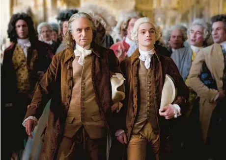  ?? APPLE TV+ ?? Michael Douglas, left, portrays Benjamin Franklin and Noah Jupe plays his grandson, Temple, in “Franklin.”