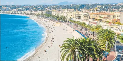  ??  ?? LAP IT UP: Behind Nice’s glitzy beaches are laid-back restaurant­s that top chefs love. Inset, classic fish stew, bouillabai­sse