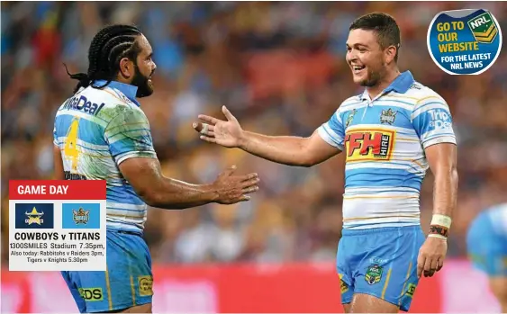  ?? PHOTO: DARREN ENGLAND/AAP ?? HAPPY TIMES: Konrad Hurrell and Ashley Taylor share the joy after the Titans’ round four win over the Brisbane Broncos at Suncorp Stadium. GO TO OUR WEBSITE FOR THE LATEST NRL NEWS