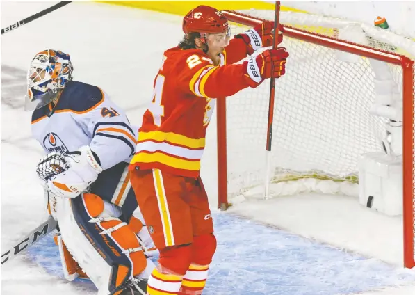  ?? AZIN GHAFFARI ?? Flames forward Brett Ritchie celebrates scoring on Edmonton Oilers goaltender Mike Smith during Wednesday's opening game of their second-round playoff series at Scotiabank Saddledome. Calgary winger Matthew Tkachuk score a hat trick in the game.