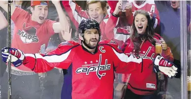  ?? — GETTY IMAGES FILES ?? Alex Ovechkin of the Capitals celebrates after scoring a goal against the Pittsburgh Penguins for his 1000th career point on Jan. 11 in Washington, DC.