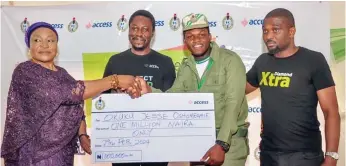  ?? ?? L-R: Co-ordinator, NYSC , Plateau State, Esther Ikupolati; Regional Manager, Retail Banking, Access Bank, Adebayo Adeyeye; Accesspren­uer N1 Million naira Winner, Okuku Jesse Oshomeghie; and Product and Segment Manager, Access bank, Samson Nwankwo at the cheque presentati­on ceremony to Accesspren­uer winners in NYSC camp, Plateau State …recently