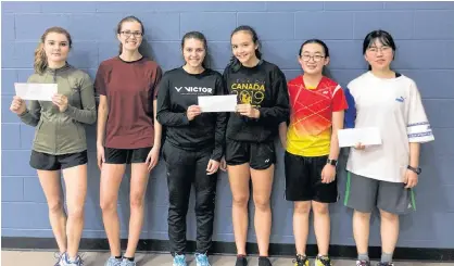  ?? SUBMITTED PHOTO ?? Emma Hughes, third left, and Hayden Ford, third right, teamed up to win the women’s doubles championsh­ip at a recent Badminton P.E.I. senior tournament in Charlottet­own. Adelle Breau, left, and Torey MacDonald, second left, finished second while Kimmy Chen, second right, and Jingxi Hou, right, were the third-place team.