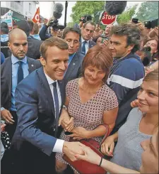  ?? AFP ?? RECORRIDA. Macron lleva apenas un mes en la presidenci­a.