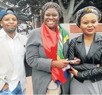  ?? Picture: NOMAZIMA NKOSI ?? NATIONAL SPIRIT: Friends, from left, Oyama Vanto, Lelethu Mahambehla­la and Siphokazi Sigenu attending the Swallows Foundation Heritage Month celebratio­ns at the Campanile last Friday