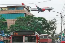  ?? Bloomberg ?? An Air India Ltd. aircraft prepares to land at Chhatrapat­i Shivaji Maharaj Internatio­nal Airport in Mumbai, yesterday.