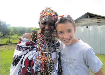  ??  ?? Mitch Kurylowicz meets a Maasai mama in Kenya.