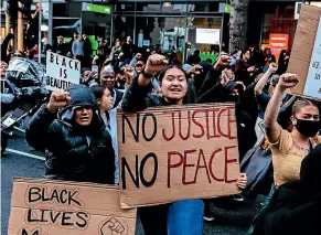  ?? ABIGAIL DOUGHERTY/STUFF ?? Thousands of people gathered at Aotea Square in Auckland CBD on June 1 in solidarity with the Black Lives Matter movement.