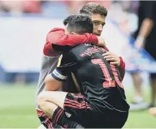  ??  ?? Lynden Gooch consoles Honeyman after the play-off final.