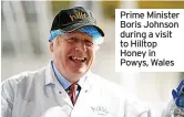  ?? ?? Prime Minister Boris Johnson during a visit to Hilltop Honey in Powys, Wales