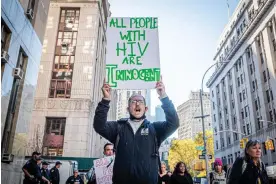  ?? November. Photograph: Erik McGregor/LightRocke­t/Getty Images ?? Activists in Manhattan demonstrat­e against criminal laws based on HIV status on 9