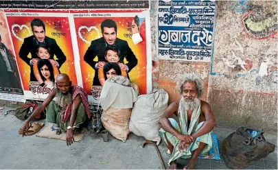  ?? PHOTO: ISTOCK ?? Beggars in the Chowringhe­e suburb of Kolkata.