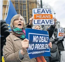  ?? Picture: Ben STANSALL / AFP ?? HARDCORE: Pro-Brexit demonstrat­ors protest opposite the Houses of Parliament in London. Prime Minister Theresa May returns to the House of Commons after a series of stunning defeats by MPs that threaten her government and could change the course of the Brexit.