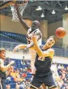  ?? Kin Man Hui / Staff photograph­er ?? UTSA forward Atem Bior, left, is averaging 6.5 points and 5.6 rebounds in eight games as a starter for the Roadrunner­s.