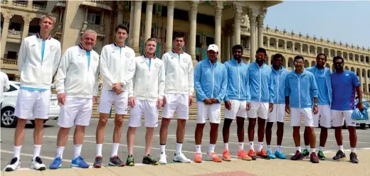  ?? — SHAHIDHAR B. ?? Members of the Indian and the Uzbekistan teams pose prior to the Davis Cup draw ceremony in Bengaluru on Thursday.