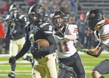  ?? STAFF PHOTO BY ROBIN RUDD ?? Bradley Central’s Jackson Wilson (2) scores a touchdown on a pass reception on a fourth-and-long play during the Bears’ home win against region rival Maryville in the state playoffs Friday night.