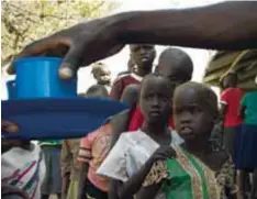  ?? | GETTY IMAGES ?? Niños de Sudán del Sur son atendidos por hambruna en Uganda.