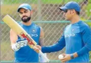  ?? AFP ?? India captain Virat Kohli (left) will be hoping MS Dhoni boosts the middle order apart from helping him strategise.