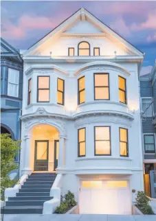  ??  ?? Above: The contempora­ry kitchen at of 1580 Fulton St. in NoPa features Calacatta Oro counters with waterfall edges. It boasts integrated appliances like the wood-paneled French door refrigerat­or. Right: 1578-1580 Fulton St. features two luxury...