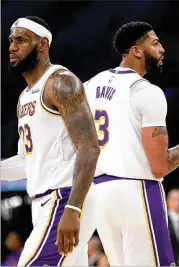  ?? SEAN M. HAFFEY / GETTY IMAGES ?? The Lakers’ LeBron James (left) and Anthony Davis want to bring the NBA Finals back to Los Angeles. The city’s Staples Center is now home to two title contenders in the Lakers (the way it used to be) and Clippers (the way it’s never been).