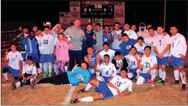  ?? Photos by FRANK CROWE / For the Calhoun Times ?? ( The Gordon Central boys team poses for a photo after their win over Pepperell on Friday. ( Gordon Central’s Emily Salazar (16) battles for possession of the ball with Pepperell’s Marleni Perez on Friday.