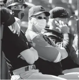  ?? CHRISTIAN PETERSEN GETTY IMAGES ?? Indians manager Terry Francona (center) says the team did not look the other way over sexual harassment issues alleged against ex-employee Mickey Callaway.