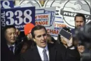  ?? AP PHOTO/ BEBETO MATTHEWS, FILE ?? This Nov. 14, 2018, photo shows New York State Sen. Michael Gianaris, center, as he calls on supporters to remove the Amazon app from their phones and boycott the company, as he address a coalition rally and press conference, in New York.
