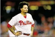  ?? LAURENCE KESTERSON/THE ASSOCIATED PRESS ?? The Phillies’ Freddy Galvis reacts after a child was removed from the stands after being struck by a foul ball during the eighth inning of a game against the Cardinals Saturday in Philadelph­ia.