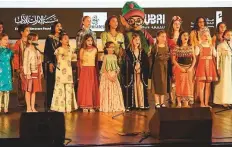  ?? Virendra Saklani/Gulf News ?? ■ Dubai Youth Choir presented the song ‘Hello friends, our journey never ends’, the first-ever jingle created for Emirates LitFest. Singer Zigzag Ghanim also performed at the event.