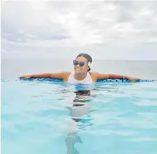  ?? Picture: JOHN KAMEA ?? A guest takes a dip in the infinity pool.