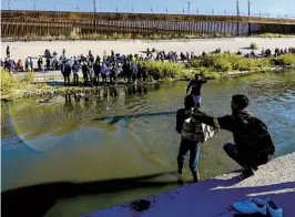  ?? CHRISTIAN CHAVEZ AP ?? Thousands of migrants in cities like Ciudad Juarez are waiting in Mexico for the expiration of Title 42 restrictio­ns so they can seek asylum in the U.S.