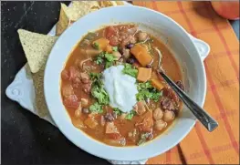  ?? Gretchen mckay / Pittsburgh Post-gazette-tns ?? a spicy coconut sweet potato stew is just the thing to take the chill off of a cool autumn evening.