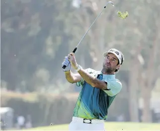  ?? CHRISTIAN PETERSEN/GETTY IMAGES ?? Bubba Watson plays a shot on the ninth hole en route to a final-round 2-under 69 and a two-stroke victory at the Genesis Open Sunday at Riviera Country Club in Pacific Palisades, Calif.