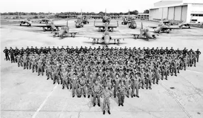  ??  ?? Part of the 300 personnel involved in the 10 day Mini Exercise of the Royal Malaysian Air Force Paradise 4/17 at Labuan Air Base yesterday. - Bernama photo